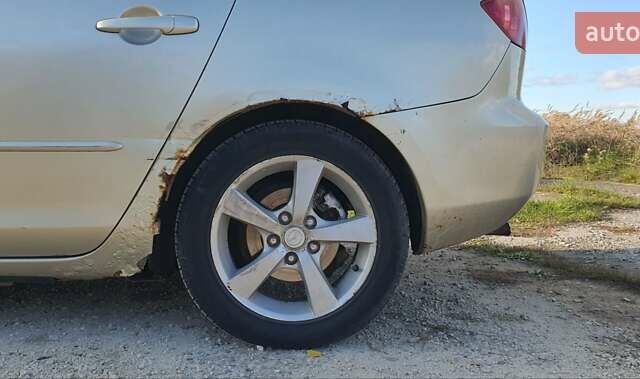 Мазда 3 2004 в Калуше на Automoto.ua Серый Мазда 3, объемом двигателя 1.6 л и пробегом 244 тыс. км за 2900 $, фото 13 на Automoto.ua