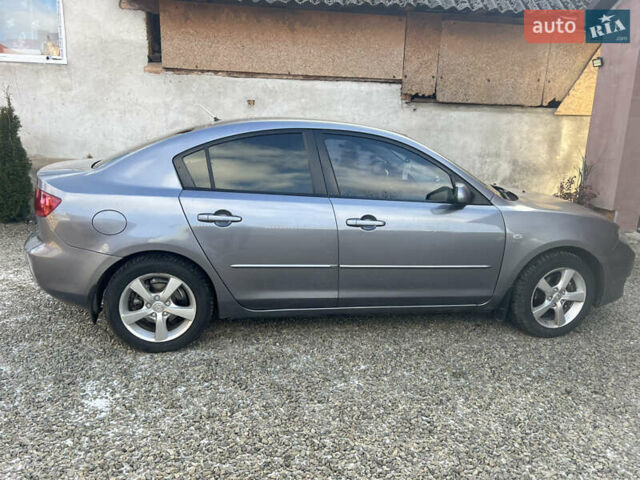 Сірий Мазда 3, об'ємом двигуна 1.56 л та пробігом 211 тис. км за 3900 $, фото 9 на Automoto.ua