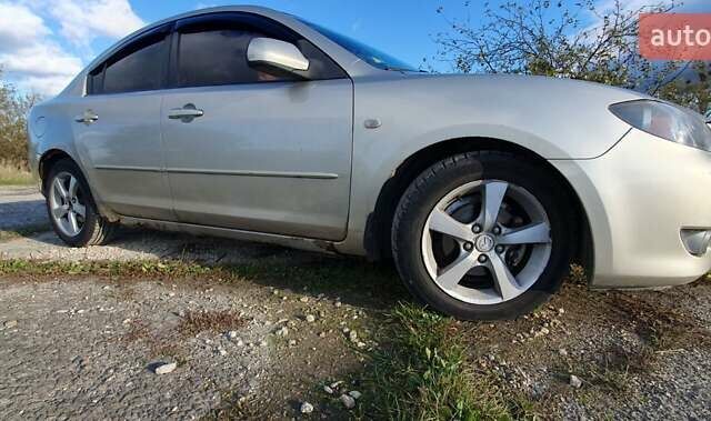 Мазда 3 2004 в Калуше на Automoto.ua Серый Мазда 3, объемом двигателя 1.6 л и пробегом 244 тыс. км за 2900 $, фото 28 на Automoto.ua