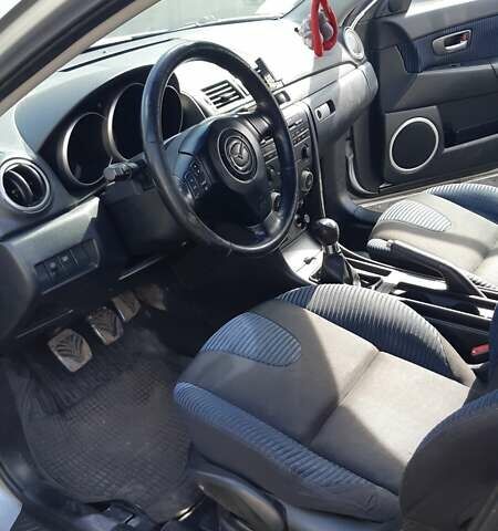 Сірий Мазда 3, об'ємом двигуна 2 л та пробігом 204 тис. км за 4500 $, фото 7 на Automoto.ua
