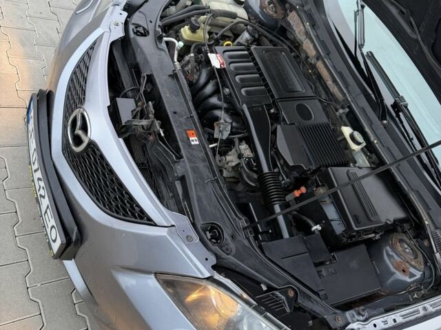 Серый Мазда 3, объемом двигателя 1.6 л и пробегом 220 тыс. км за 3650 $, фото 22 на Automoto.ua