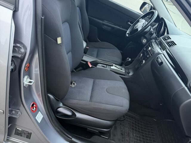 Серый Мазда 3, объемом двигателя 1.6 л и пробегом 220 тыс. км за 3650 $, фото 12 на Automoto.ua