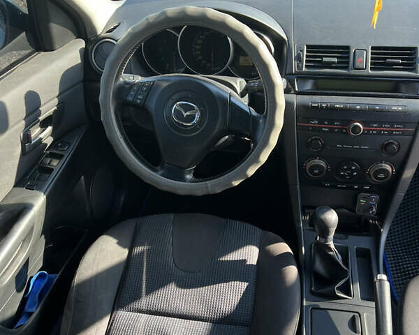 Серый Мазда 3, объемом двигателя 1.56 л и пробегом 335 тыс. км за 3300 $, фото 5 на Automoto.ua