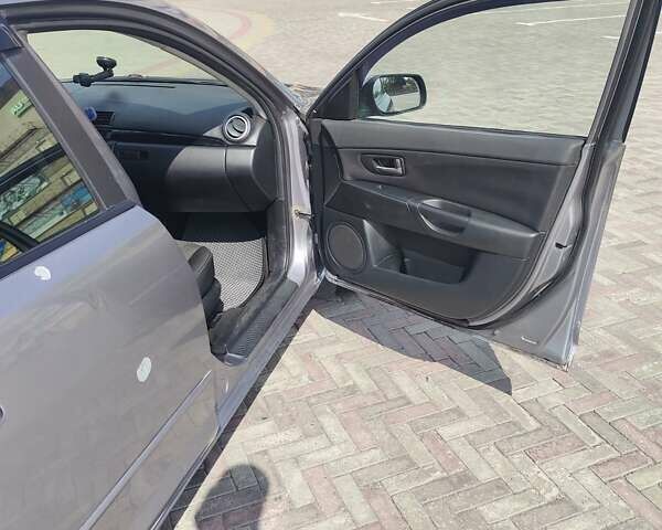 Серый Мазда 3, объемом двигателя 1.6 л и пробегом 288 тыс. км за 3300 $, фото 6 на Automoto.ua