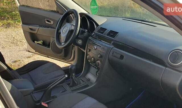 Мазда 3 2004 в Калуше на Automoto.ua Серый Мазда 3, объемом двигателя 1.6 л и пробегом 244 тыс. км за 2900 $, фото 26 на Automoto.ua
