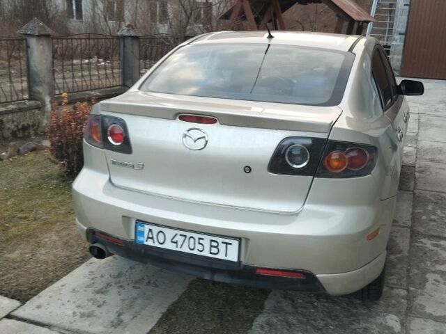 Серый Мазда 3, объемом двигателя 2 л и пробегом 270 тыс. км за 2700 $, фото 1 на Automoto.ua