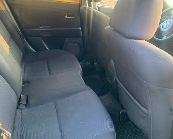 Сірий Мазда 3, об'ємом двигуна 1.56 л та пробігом 315 тис. км за 3999 $, фото 11 на Automoto.ua