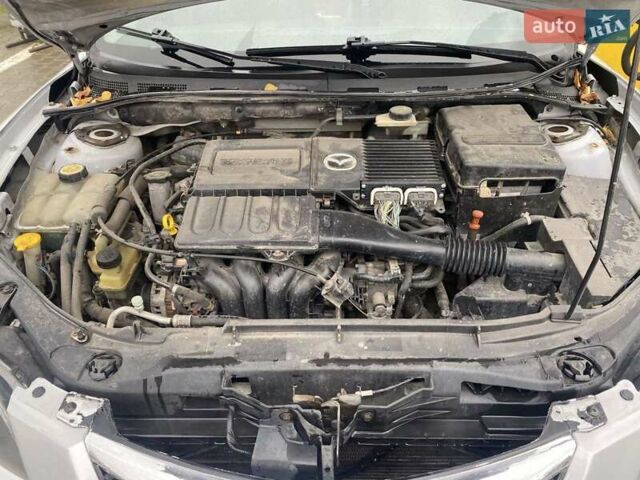 Серый Мазда 3, объемом двигателя 1.6 л и пробегом 282 тыс. км за 4600 $, фото 6 на Automoto.ua