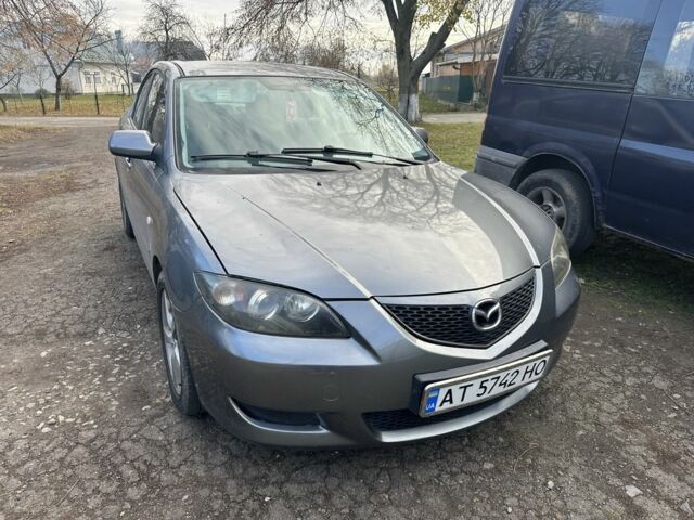 Серый Мазда 3, объемом двигателя 1.6 л и пробегом 189 тыс. км за 3350 $, фото 1 на Automoto.ua