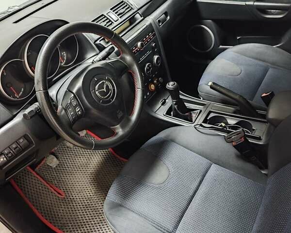 Серый Мазда 3, объемом двигателя 2 л и пробегом 250 тыс. км за 3600 $, фото 4 на Automoto.ua