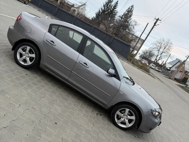 Серый Мазда 3, объемом двигателя 1.6 л и пробегом 220 тыс. км за 3650 $, фото 4 на Automoto.ua