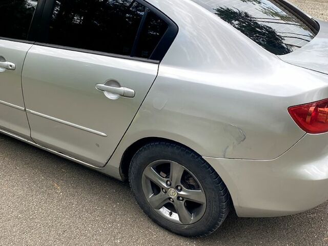 Серый Мазда 3, объемом двигателя 1.6 л и пробегом 262 тыс. км за 3600 $, фото 2 на Automoto.ua