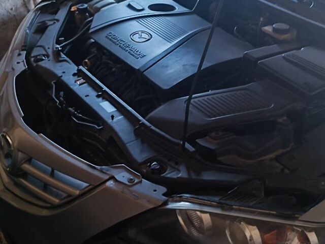 Серый Мазда 3, объемом двигателя 2.3 л и пробегом 215 тыс. км за 4600 $, фото 1 на Automoto.ua
