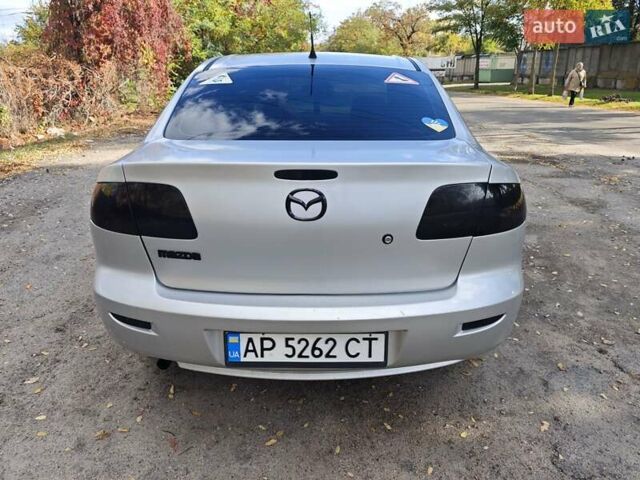Серый Мазда 3, объемом двигателя 2 л и пробегом 250 тыс. км за 3600 $, фото 3 на Automoto.ua