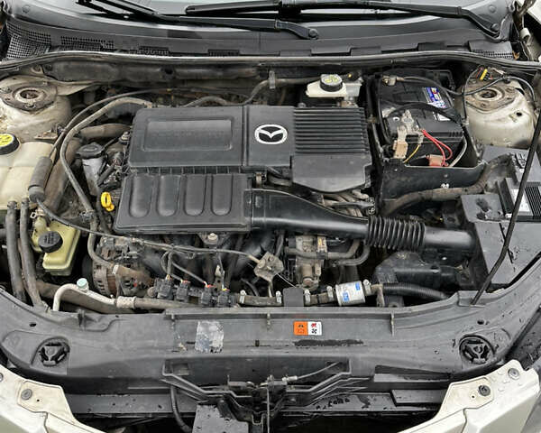 Серый Мазда 3, объемом двигателя 1.6 л и пробегом 170 тыс. км за 4600 $, фото 10 на Automoto.ua
