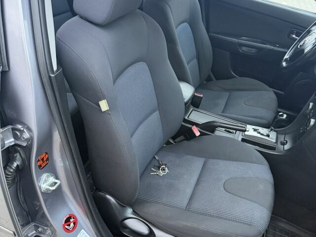 Серый Мазда 3, объемом двигателя 1.6 л и пробегом 220 тыс. км за 3650 $, фото 13 на Automoto.ua