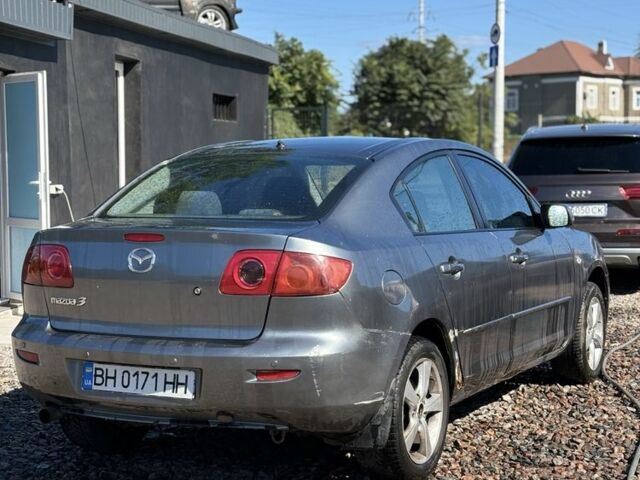 Серый Мазда 3, объемом двигателя 1.6 л и пробегом 219 тыс. км за 1750 $, фото 1 на Automoto.ua