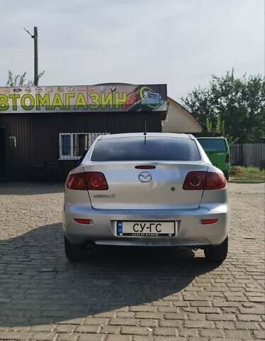 Серый Мазда 3, объемом двигателя 1.56 л и пробегом 250 тыс. км за 3900 $, фото 2 на Automoto.ua