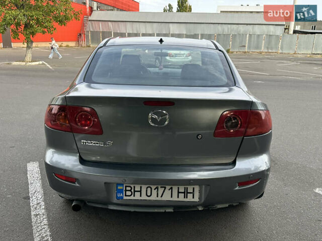 Серый Мазда 3, объемом двигателя 1.6 л и пробегом 180 тыс. км за 3000 $, фото 6 на Automoto.ua