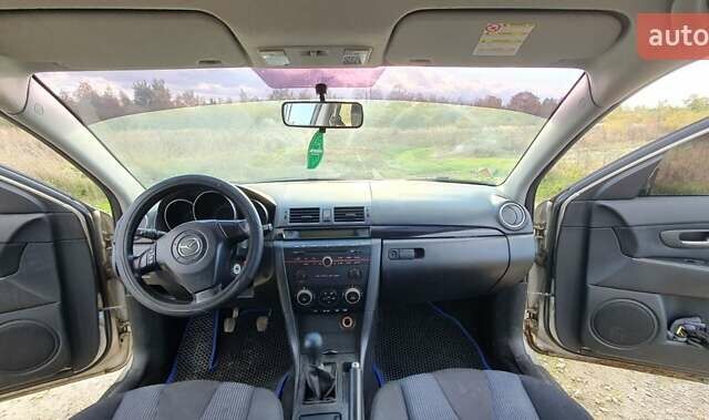 Мазда 3 2004 в Калуше на Automoto.ua Серый Мазда 3, объемом двигателя 1.6 л и пробегом 244 тыс. км за 2900 $, фото 27 на Automoto.ua