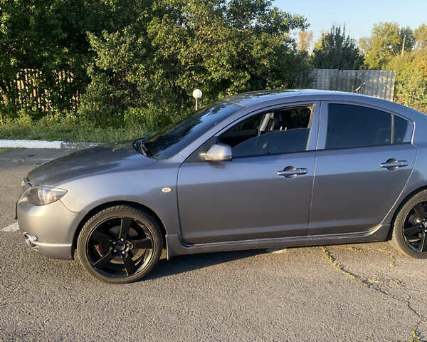 Серый Мазда 3, объемом двигателя 2.3 л и пробегом 220 тыс. км за 3800 $, фото 2 на Automoto.ua