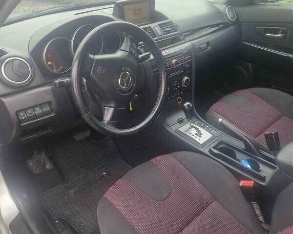 Серый Мазда 3, объемом двигателя 1.6 л и пробегом 240 тыс. км за 4500 $, фото 7 на Automoto.ua