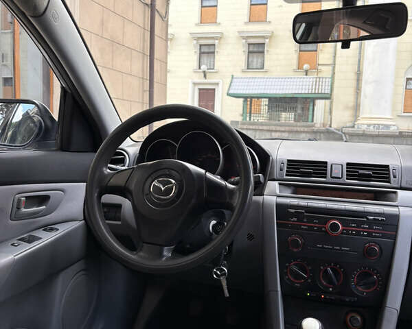 Серый Мазда 3, объемом двигателя 1.6 л и пробегом 290 тыс. км за 4350 $, фото 12 на Automoto.ua