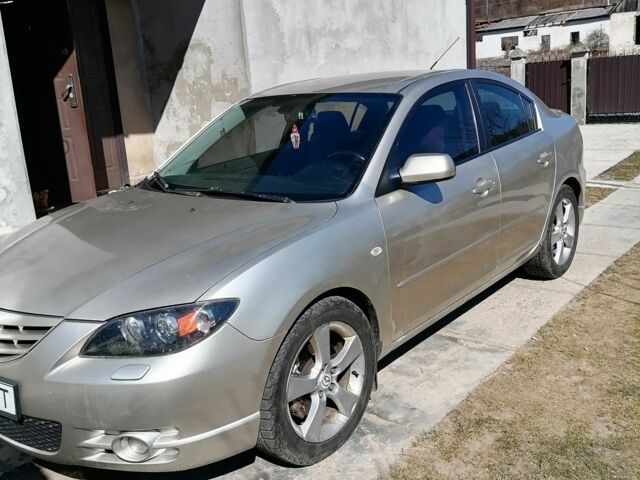 Серый Мазда 3, объемом двигателя 2 л и пробегом 270 тыс. км за 3200 $, фото 2 на Automoto.ua