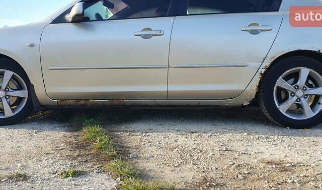 Мазда 3 2004 в Калуше на Automoto.ua Серый Мазда 3, объемом двигателя 1.6 л и пробегом 244 тыс. км за 2900 $, фото 14 на Automoto.ua