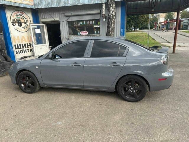 Сірий Мазда 3, об'ємом двигуна 2 л та пробігом 300 тис. км за 5500 $, фото 11 на Automoto.ua