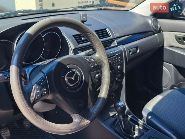 Серый Мазда 3, объемом двигателя 2 л и пробегом 190 тыс. км за 3500 $, фото 9 на Automoto.ua