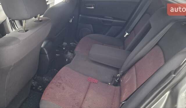 Серый Мазда 3, объемом двигателя 1.6 л и пробегом 192 тыс. км за 3500 $, фото 27 на Automoto.ua