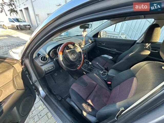 Серый Мазда 3, объемом двигателя 1.56 л и пробегом 349 тыс. км за 4400 $, фото 5 на Automoto.ua