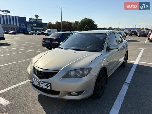 Серый Мазда 3, объемом двигателя 1.6 л и пробегом 370 тыс. км за 4000 $, фото 1 на Automoto.ua