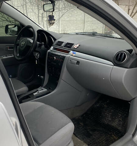 Серый Мазда 3, объемом двигателя 1.6 л и пробегом 315 тыс. км за 2550 $, фото 5 на Automoto.ua