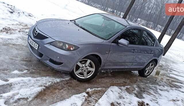 Серый Мазда 3, объемом двигателя 1.6 л и пробегом 362 тыс. км за 3999 $, фото 3 на Automoto.ua