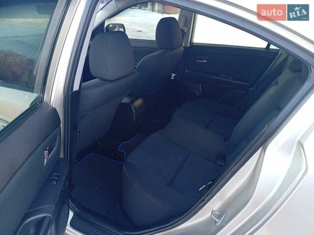 Серый Мазда 3, объемом двигателя 1.6 л и пробегом 245 тыс. км за 3000 $, фото 8 на Automoto.ua