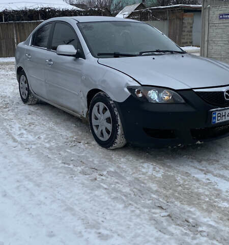 Серый Мазда 3, объемом двигателя 1.6 л и пробегом 315 тыс. км за 2550 $, фото 1 на Automoto.ua