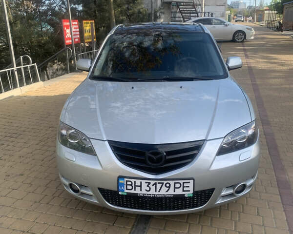 Серый Мазда 3, объемом двигателя 2 л и пробегом 333 тыс. км за 4650 $, фото 2 на Automoto.ua