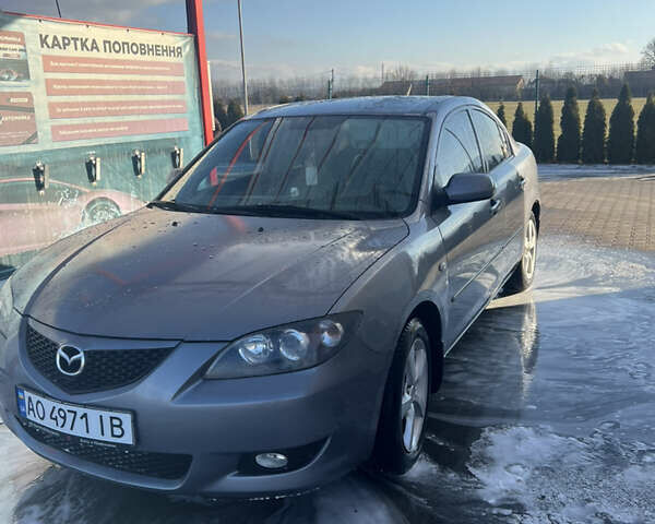 Сірий Мазда 3, об'ємом двигуна 1.56 л та пробігом 211 тис. км за 3900 $, фото 3 на Automoto.ua