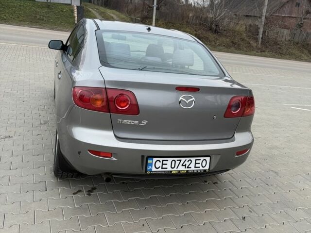 Серый Мазда 3, объемом двигателя 1.6 л и пробегом 220 тыс. км за 3650 $, фото 6 на Automoto.ua