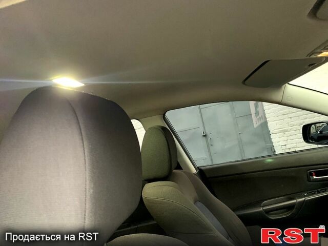 Сірий Мазда 3, об'ємом двигуна 1.6 л та пробігом 117 тис. км за 4200 $, фото 3 на Automoto.ua