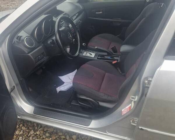 Серый Мазда 3, объемом двигателя 1.6 л и пробегом 240 тыс. км за 4500 $, фото 6 на Automoto.ua