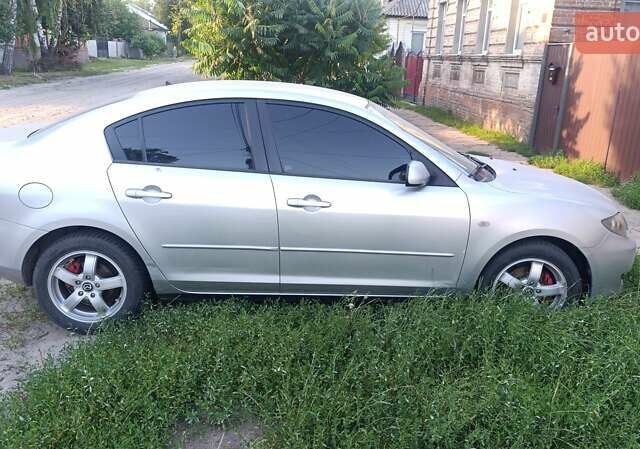 Сірий Мазда 3, об'ємом двигуна 1.6 л та пробігом 235 тис. км за 3700 $, фото 1 на Automoto.ua