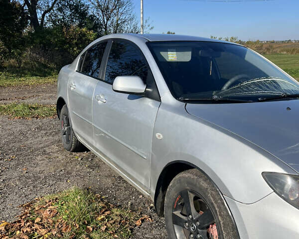 Серый Мазда 3, объемом двигателя 1.56 л и пробегом 335 тыс. км за 3300 $, фото 1 на Automoto.ua