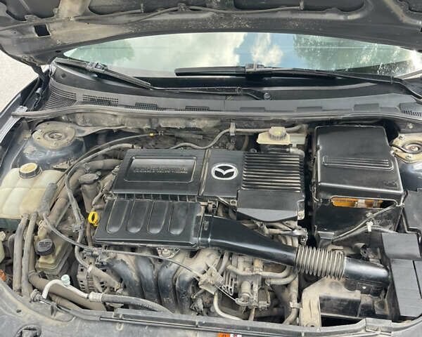 Сірий Мазда 3, об'ємом двигуна 1.6 л та пробігом 230 тис. км за 3900 $, фото 6 на Automoto.ua