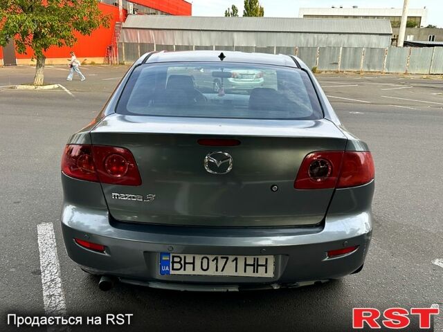 Серый Мазда 3, объемом двигателя 1.6 л и пробегом 180 тыс. км за 3500 $, фото 1 на Automoto.ua