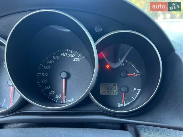 Сірий Мазда 3, об'ємом двигуна 1.6 л та пробігом 316 тис. км за 4200 $, фото 16 на Automoto.ua