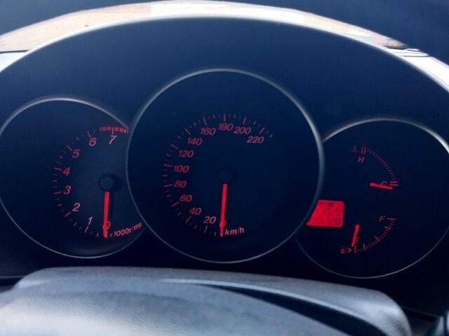 Серый Мазда 3, объемом двигателя 2 л и пробегом 190 тыс. км за 4200 $, фото 2 на Automoto.ua