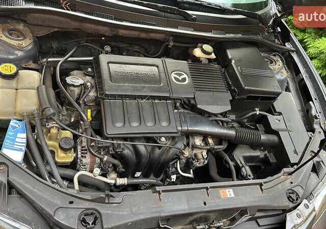 Сірий Мазда 3, об'ємом двигуна 1.6 л та пробігом 187 тис. км за 3950 $, фото 10 на Automoto.ua